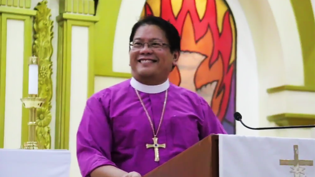 Bishop Ricardo preaching on a Wednesday fellowship